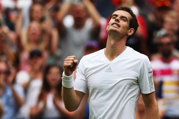 LONDON, ENGLAND - JUNE 23:  Andy Murray of Great Britain celebrates after winning his Gentlemen's Singles first round match against David Goffin of Belgium on day one of the Wimbledon Lawn Tennis Championships at the All England Lawn Tennis and Croquet Club at Wimbledon on June 23, 2014 in London, England.  (Photo by Matthew Stockman/Getty Images)