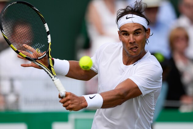 LONDON, ENGLAND - JUNE 20:  Rafael Nadal of Spain in action during his Men's Singles match against  Tommy Robredo of Spain at the BNP Paribas Tennis Classic at the Hurlingham Club on June 20, 2014 in London, England.  Rafael Nadal won his last warm up game prior to Wimbledon 2 - 0.  (Photo by Justin Setterfield/Getty Images)
