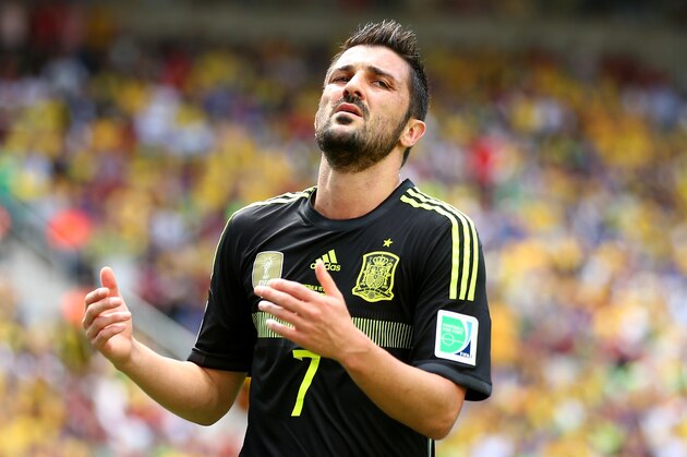 CURITIBA, BRAZIL - JUNE 23: David Villa of Spain reacts to a missed chance during the 2014 FIFA World Cup Brazil Group B match between Australia and Spain at Arena da Baixada on June 23, 2014 in Curitiba, Brazil.  (Photo by Jeff Gross/Getty Images)