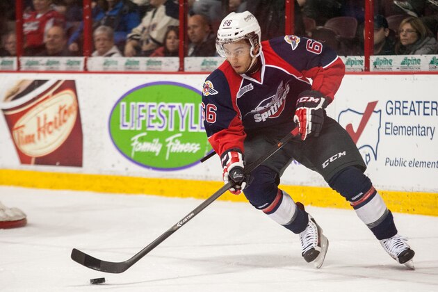 WINDSOR, ON - MARCH 06: Josh Ho-Sang #66 of the Windsor Spitfires moves the puck against the Saginaw Spirit on March 6, 2014 at the WFCU Centre in Windsor, Ontario, Canada. (Photo by Dennis Pajot/Getty Images)