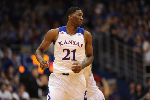 Nov 8, 2013; Lawrence, KS, USA; Kansas Jayhawks center Joel Embiid (21) walks to the near end of the court during the second half of the game against the Louisiana Monroe Warhawks at Allen Fieldhouse. Kansas won 80 - 63. Mandatory Credit: Denny Medley-USA TODAY Sports