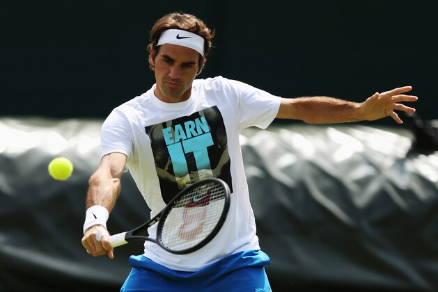 LONDON, ENGLAND - JUNE 23:  Roger Federer of Switzerland during a practice session on day one of the Wimbledon Lawn Tennis Championships at the All England Lawn Tennis and Croquet Club at Wimbledon on June 23, 2014 in London, England.  (Photo by Dan Kitwood/Getty Images)