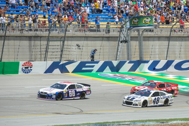 Jun 30, 2013; Sparta, KY, USA; NASCAR Sprint Cup Series driver Dale Earnhardt Jr. (88) leads Jimmie Johnson (48) during the Quaker State 400 at Kentucky Speedway. Mandatory Credit: Randy Sartin-USA TODAY Sports