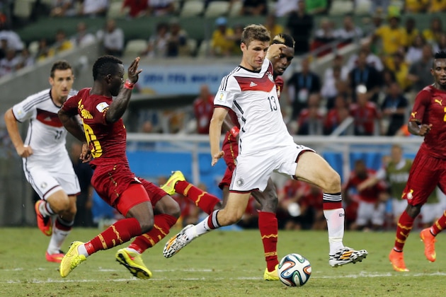 Germany's Thomas Mueller takes a shot during the group G World Cup soccer match between Germany and Ghana at the Arena Castelao in Fortaleza, Brazil, Saturday, June 21, 2014. (AP Photo/Frank Augstein)