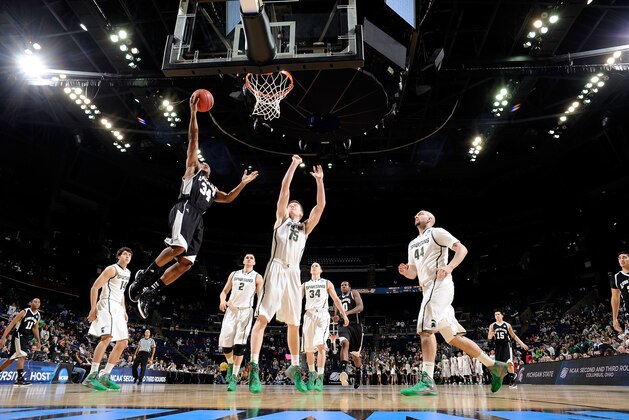 COLUMBUS, OH - MARCH 16: Kurt Joseph #34 of the LIU Brooklyn Blackbirds drives to the basket against Keenan Wetzel #15 of the Michigan State Spartans during the second round of the 2012 NCAA Men's Basketball Tournament at Nationwide Arena on March 16, 2012 in Columbus, Ohio.  (Photo by Jamie Sabau/Getty Images)