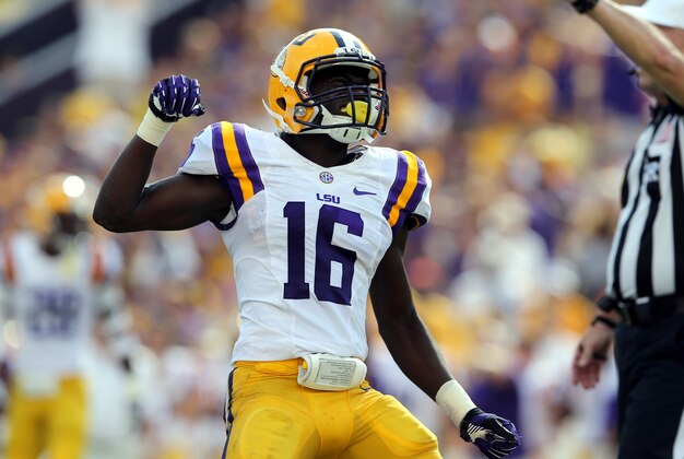 Oct 12, 2013; Baton Rouge, LA, USA; LSU Tigers defensive back Tre'Davious White (16) celebrates a play during the second quarter of their game against the Florida Gators at Tiger Stadium. Mandatory Credit: Chuck Cook-USA TODAY Sports