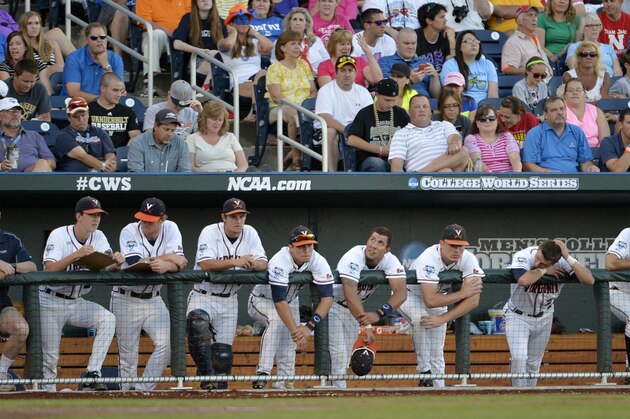Virginia players watch from the bench in the third inning of the opening game of the best-of-three NCAA baseball College World Series finals against Vanderbilt in Omaha, Neb., Monday, June 23, 2014. (AP Photo/Ted Kirk) Virginia players watch from the bench in the third inning of the opening game of the best-of-three NCAA baseball College World Series finals against Vanderbilt in Omaha, Neb., Monday, June 23, 2014. (AP Photo/Ted Kirk)