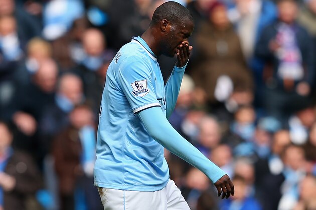 MANCHESTER, ENGLAND - MAY 11:  Yaya Toure of Manchester City reacts after sustaining an injury during the Barclays Premier League match between Manchester City and West Ham United at the Etihad Stadium on May 11, 2014 in Manchester, England.  (Photo by Alex Livesey/Getty Images)