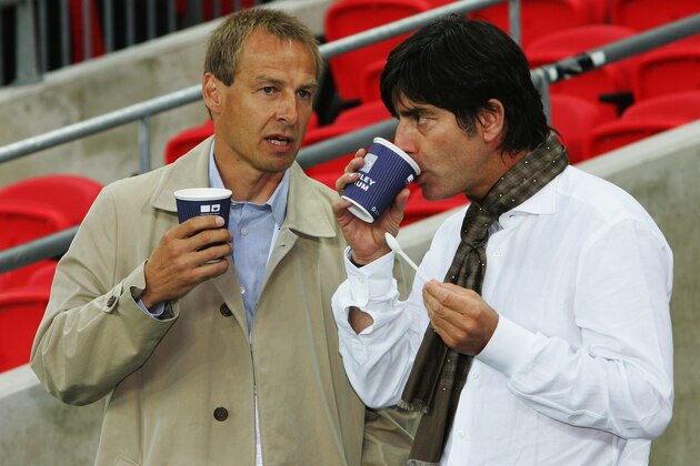 LONDON - AUGUST 22:  Juergen Klinsmann, ex-manager of Germany (L) and Joachim Low, current manager of Germany, talk prior during the international friendly match between England and Germany at Wembley stadium on August 22, 2007 in London, England.  (Photo by Martin Rose/Bongarts/Getty Images)