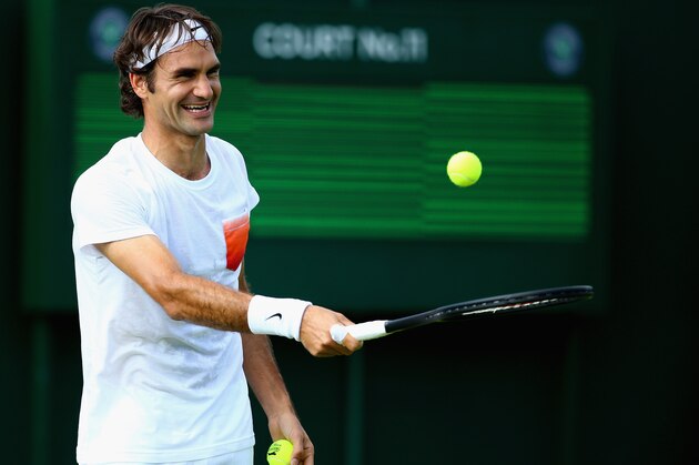 LONDON, ENGLAND - JUNE 21:  Roger Federer of Switzerland in action during a practice session during previews for Wimbledon Championships at Wimbledon on June 21, 2014 in London, England.  (Photo by Al Bello/Getty Images)