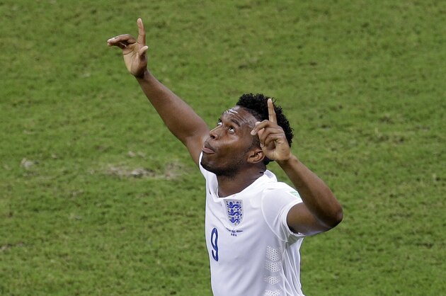 England's Daniel Sturridge celebrates scoring his side's first goal during the group D World Cup soccer match between England and Italy at the Arena da Amazonia in Manaus, Brazil, Saturday, June 14, 2014.  (AP Photo/Themba Hadebe)