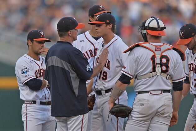 Omaha, NE - JUNE 23:  Head coach Brian O'Connor (C) of the Virginia Cavaliers takes out pitcher Nathan Kirby #19 in the third inning against the Vanderbilt Commodores during game one of the College World Series Championship on June 23, 2014 at TD Ameritrade Park in Omaha, Nebraska.  (Photo by Peter Aiken/Getty Images)