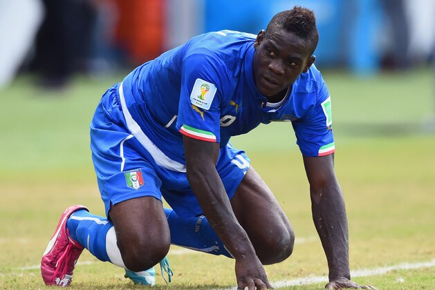 NATAL, BRAZIL - JUNE 24:  Mario Balotelli of Italy reacts during the 2014 FIFA World Cup Brazil Group D match between Italy and Uruguay at Estadio das Dunas on June 24, 2014 in Natal, Brazil.  (Photo by Matthias Hangst/Getty Images)