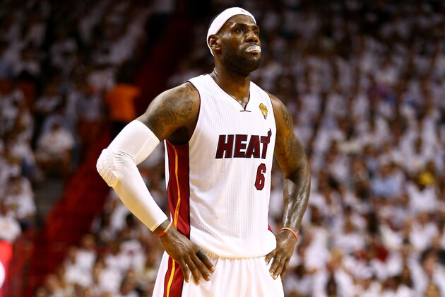 MIAMI, FL - JUNE 12:  LeBron James #6 of the Miami Heat looks on against the San Antonio Spurs during Game Four of the 2014 NBA Finals at American Airlines Arena on June 12, 2014 in Miami, Florida. NOTE TO USER: User expressly acknowledges and agrees that, by downloading and or using this photograph, User is consenting to the terms and conditions of the Getty Images License Agreement.  (Photo by Andy Lyons/Getty Images)