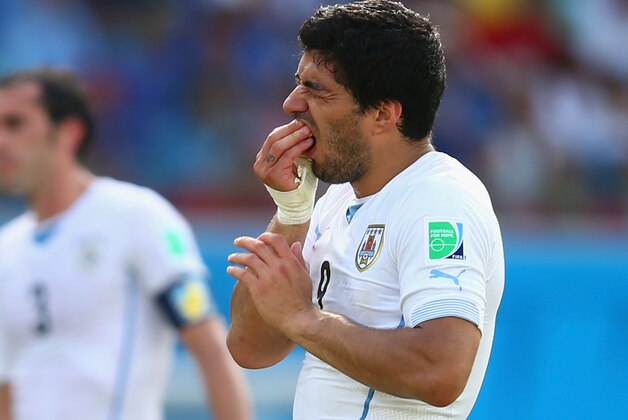 NATAL, BRAZIL - JUNE 24:  Luis Suarez of Uruguay reacts during the 2014 FIFA World Cup Brazil Group D match between Italy and Uruguay at Estadio das Dunas on June 24, 2014 in Natal, Brazil.  (Photo by Clive Rose/Getty Images)