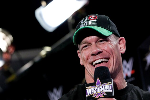 John Cena speaks during a news conference before Wrestlemania XXX at the Mercedes-Benz Super Dome in New Orleans on Sunday, April 6, 2014. (Jonathan Bachman/AP Images for WWE)