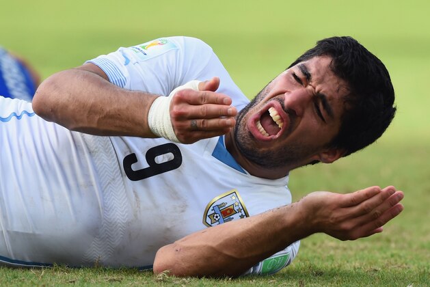 NATAL, BRAZIL - JUNE 24:  Luis Suarez of Uruguay reacts during the 2014 FIFA World Cup Brazil Group D match between Italy and Uruguay at Estadio das Dunas on June 24, 2014 in Natal, Brazil.  (Photo by Matthias Hangst/Getty Images)