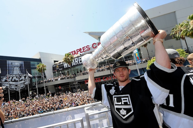 LOS ANGELES, CA - JUNE 16:  Jonathan Quick #32 of the Los Angeles Kings celebrates during the Los Angeles Kings victory parade and rally on June 16, 2014 in Los Angeles, California. (Photo by Noah Graham/NHLI via Getty Images)