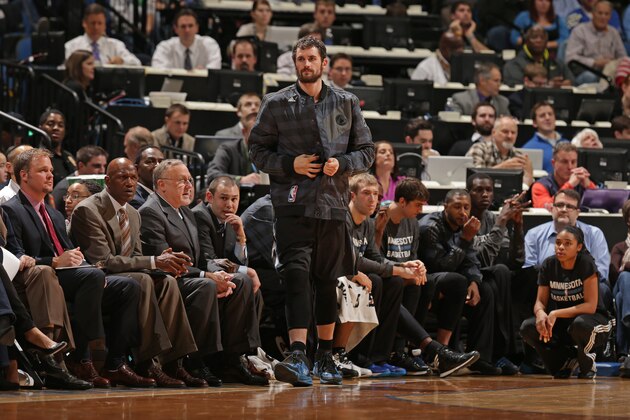 MINNEAPOLIS, MN - NOVEMBER 27:  Kevin Love #42 of the Minnesota Timberwolves stands on by the bench waiting to get in against the Denver Nuggets on November 27, 2013 at Target Center in Minneapolis, Minnesota. NOTE TO USER: User expressly acknowledges and agrees that, by downloading and or using this Photograph, user is consenting to the terms and conditions of the Getty Images License Agreement. Mandatory Copyright Notice: Copyright 2013 NBAE (Photo by Jordan Johnson/NBAE via Getty Images)