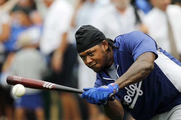 Los Angeles Dodgers' Hanley Ramirez hits the ball while waiting his turn at batting practice before a baseball game against the the Kansas City Royals at Kauffman Stadium in Kansas City, Mo., Monday, June 23, 2014.  (AP Photo/Colin E. Braley)