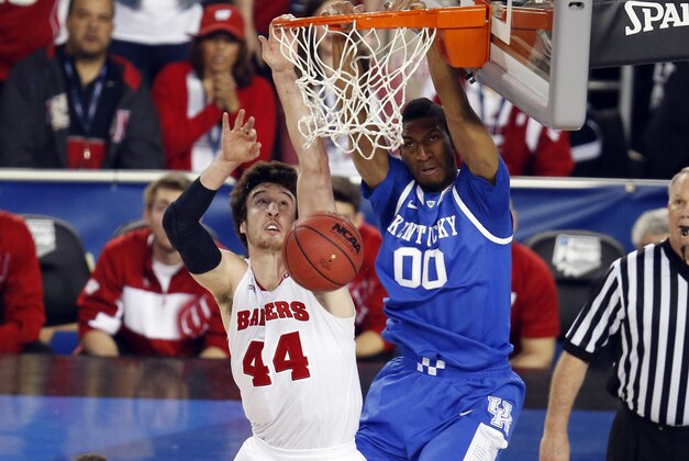 Apr 5, 2014; Arlington, TX, USA; Kentucky Wildcats forward Marcus Lee (00) dunks against Wisconsin Badgers forward Frank Kaminsky (44) in the first half during the semifinals of the Final Four in the 2014 NCAA Mens Division I Championship tournament at AT&T Stadium. Mandatory Credit: Matthew Emmons-USA TODAY Sports