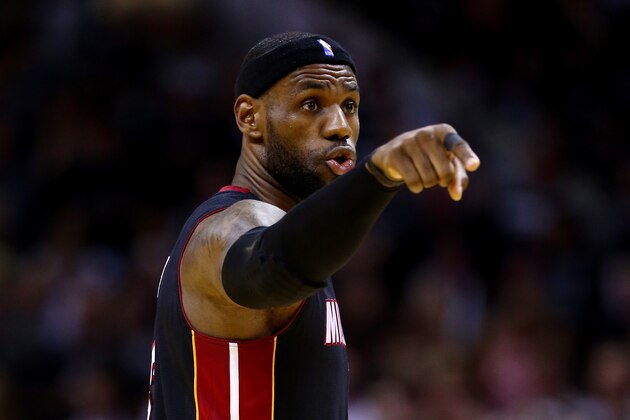 SAN ANTONIO, TX - JUNE 15: LeBron James #6 of the Miami Heat calls a play against the San Antonio Spurs during Game Five of the 2014 NBA Finals at the AT&T Center on June 15, 2014 in San Antonio, Texas. NOTE TO USER: User expressly acknowledges and agrees that, by downloading and or using this photograph, User is consenting to the terms and conditions of the Getty Images License Agreement.  (Photo by Andy Lyons/Getty Images)