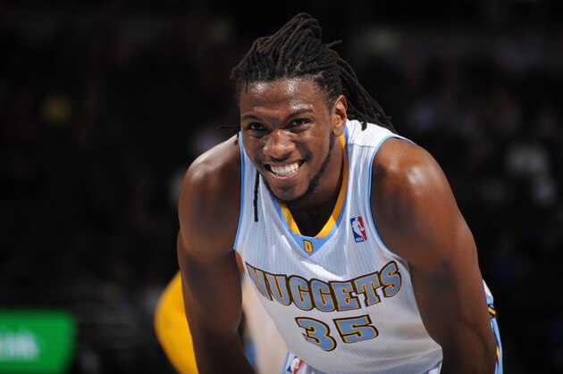 DENVER, CO - March 31: Kenneth Faried #35 of the Denver Nuggets looks on against the Memphis Grizzlies on March 31, 2014 at the Pepsi Center in Denver, Colorado. NOTE TO USER: User expressly acknowledges and agrees that, by downloading and/or using this Photograph, user is consenting to the terms and conditions of the Getty Images License Agreement. Mandatory Copyright Notice: Copyright 2014 NBAE (Photo by Bart Young/NBAE via Getty Images)
