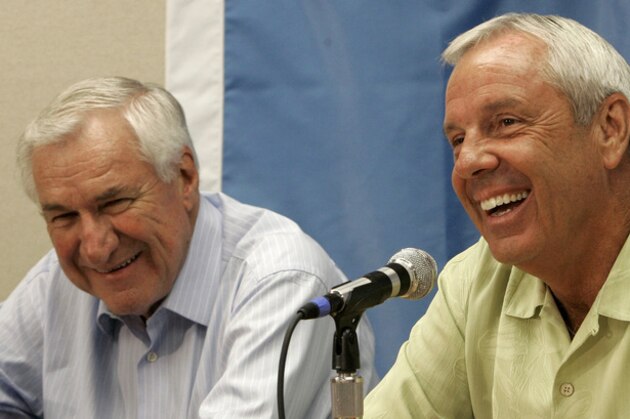 Former North Carolina coach Dean Smith, left, and current coach Roy Williams smile during a news conference in Chapel Hill, N.C., Wednesday, Sept. 5, 2007. Williams will join his long-time mentor Smith in the Hall of Fame this week. (AP Photo/Gerry Broome)