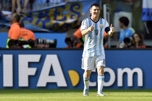 Argentina's Lionel Messi gives his teammates a thumbs up after scoring his side's lone goal to give Argentina a 1-0 victory over Iran during the group F World Cup soccer match between Argentina and Iran at the Mineirao Stadium in Belo Horizonte, Brazil, Saturday, June 21, 2014. (AP Photo/Martin Meissner)