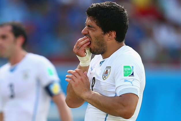 NATAL, BRAZIL - JUNE 24:  Luis Suarez of Uruguay reacts during the 2014 FIFA World Cup Brazil Group D match between Italy and Uruguay at Estadio das Dunas on June 24, 2014 in Natal, Brazil.  (Photo by Clive Rose/Getty Images)