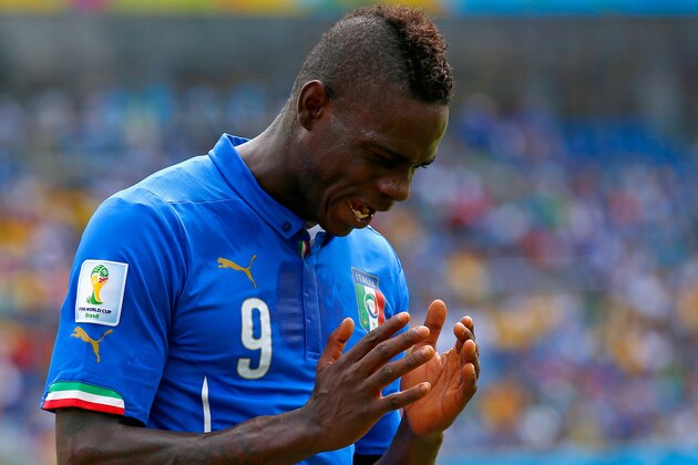 NATAL, BRAZIL - JUNE 24:  Mario Balotelli of Italy reacts during the 2014 FIFA World Cup Brazil Group D match between Italy and Uruguay at Estadio das Dunas on June 24, 2014 in Natal, Brazil.  (Photo by Clive Rose/Getty Images)