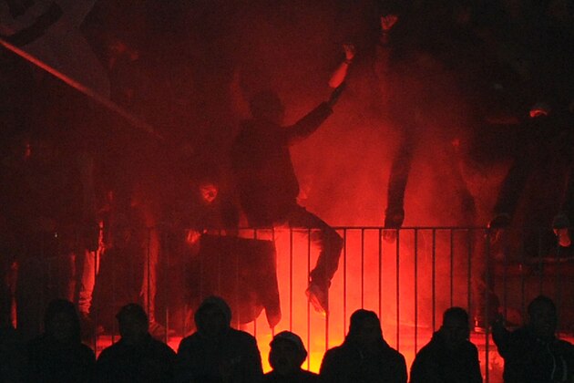 NAPLES, ITALY - MARCH 23:  Fans of Napoli during the Serie A match between SSC Napoli and ACF Fiorentina at Stadio San Paolo on March 23, 2014 in Naples, Italy.  (Photo by Giuseppe Bellini/Getty Images)