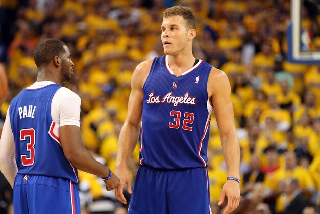 Apr 24, 2014; Oakland, CA, USA; Los Angeles Clippers guard Chris Paul (3) and forward Blake Griffin (32) before Griffin goes to the free throw line against the Golden State Warriors during the fourth quarter of game three of the first round of the 2014 NBA Playoffs at Oracle Arena. The Los Angeles Clippers defeated the Golden State Warriors 98-96. Mandatory Credit: Kelley L Cox-USA TODAY Sports