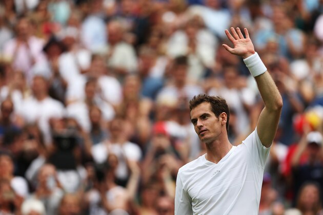 LONDON, ENGLAND - JUNE 23:  Andy Murray of Great Britain acknowledgese the fans after winning his Gentlemen's Singles first round match against David Goffin of Belgium on day one of the Wimbledon Lawn Tennis Championships at the All England Lawn Tennis and Croquet Club at Wimbledon on June 23, 2014 in London, England.  (Photo by Matthew Stockman/Getty Images)