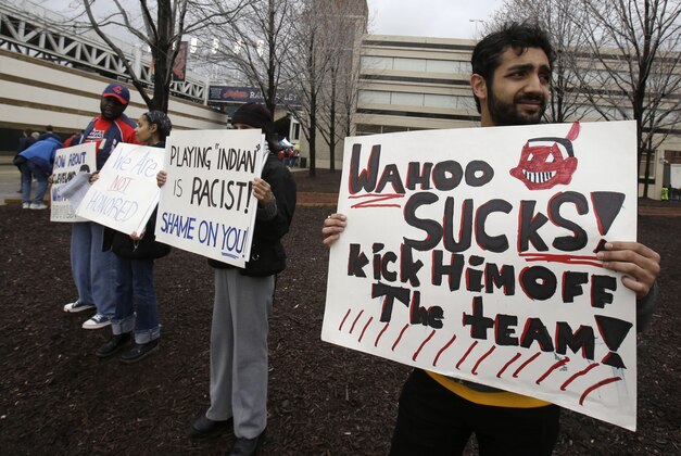 Akshai Singh protests against the use of Chief Wahoo by the Cleveland Indians before a baseball game between the Minnesota Twins and the Cleveland Indians, Friday, April 4, 2014, in Cleveland. (AP Photo/Tony Dejak)