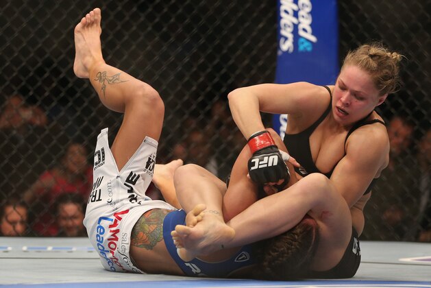 ANAHEIM, CA - FEBRUARY 23:  Ronda Rousey fights Liz Carmouche during their UFC Bantamweight Title bout at Honda Center on February 23, 2013 in Anaheim, California.  (Photo by Jeff Gross/Getty Images)