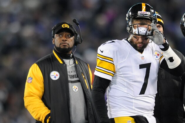 Pittsburgh Steelers head coach Mike Tomlin stands on the sideline as quarterback Ben Roethlisberger walks off the field in the second half of an NFL football game against the Baltimore Ravens, Thursday, Nov. 28, 2013, in Baltimore. (AP Photo/Gail Burton)
