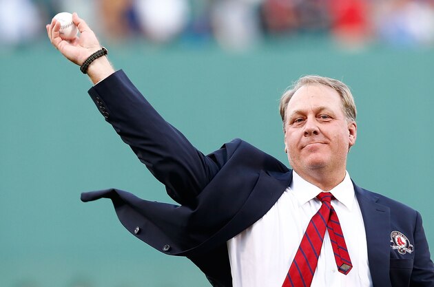 BOSTON, MA - AUGUST 03: Former Boston Red Sox pitcher Curt Schilling #38 throws out the first pitch after being inducted into the Red Sox Hall of Fame prior to the game against the Minnesota Twins during the game on August 3, 2012 at Fenway Park in Boston, Massachusetts. (Photo by Jared Wickerham/Getty Images)