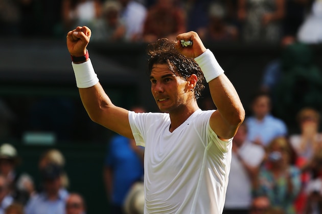 LONDON, ENGLAND - JUNE 24:  Rafael Nadal of Spain celebrates winning his Gentlemen's Singles first round match against Martin Klizan of Slovakia on day two of the Wimbledon Lawn Tennis Championships at the All England Lawn Tennis and Croquet Club at Wimbledon on June 24, 2014 in London, England.  (Photo by Al Bello/Getty Images)