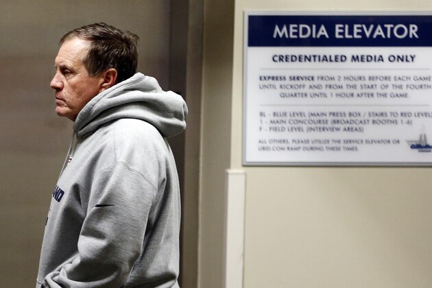 New England Patriots NFL football head coach Bill Belichick waits for the elevator after speaking during a news conference at Gillette Stadium in Foxborough, Mass., Friday, May 3, 2013. (AP Photo/Michael Dwyer)