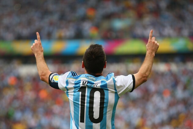PORTO ALEGRE, BRAZIL - JUNE 25:  Lionel Messi of Argentina celebrates scoring his team's first goal during the 2014 FIFA World Cup Brazil Group F match between Nigeria and Argentina at Estadio Beira-Rio on June 25, 2014 in Porto Alegre, Brazil.  (Photo by Paul Gilham/Getty Images)