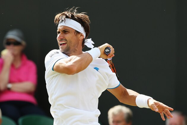 LONDON, ENGLAND - JUNE 25:  David Ferrer of Spain during his Gentlemen's Singles second round match against Andrey Kuznetsov of Russia on day three of the Wimbledon Lawn Tennis Championships at the All England Lawn Tennis and Croquet Club at Wimbledon on June 25, 2014 in London, England.  (Photo by Jan Kruger/Getty Images)