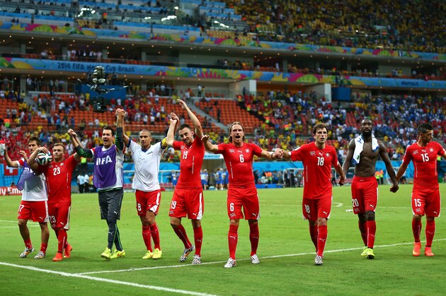 MANAUS, BRAZIL - JUNE 25:  Switzerland players acknowledge the fans after a 3-0 victory over Honduras in the 2014 FIFA World Cup Brazil Group E match between Honduras and Switzerland at Arena Amazonia on June 25, 2014 in Manaus, Brazil.  (Photo by Clive Brunskill/Getty Images)