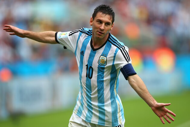 PORTO ALEGRE, BRAZIL - JUNE 25:  Lionel Messi of Argentina celebrates scoring his team's second goal and his second of the game during the 2014 FIFA World Cup Brazil Group F match between Nigeria and Argentina at Estadio Beira-Rio on June 25, 2014 in Porto Alegre, Brazil.  (Photo by Ian Walton/Getty Images)