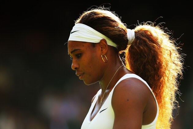 LONDON, ENGLAND - JUNE 24:  Serena Williams of the United States in action during her Ladies' Singles first round match against Anna Tatishvili of the United States on day two of the Wimbledon Lawn Tennis Championships at the All England Lawn Tennis and Croquet Club at Wimbledon on June 24, 2014 in London, England.  (Photo by Al Bello/Getty Images)