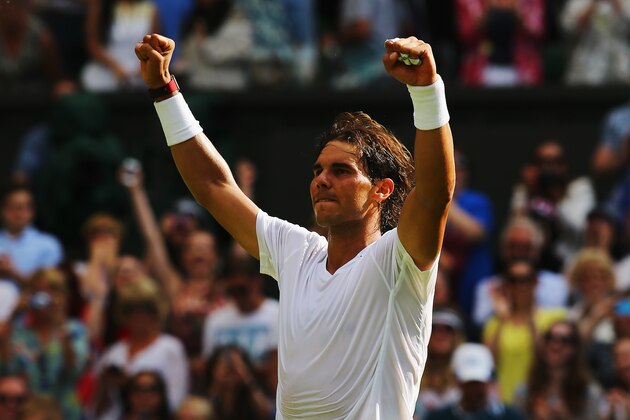 LONDON, ENGLAND - JUNE 24:  Rafael Nadal of Spain celebrates winning his Gentlemen's Singles first round match against Martin Klizan of Slovakia on day two of the Wimbledon Lawn Tennis Championships at the All England Lawn Tennis and Croquet Club at Wimbledon on June 24, 2014 in London, England.  (Photo by Al Bello/Getty Images)