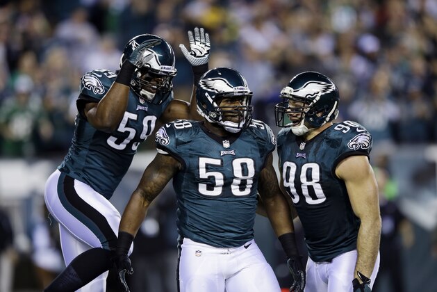 Philadelphia Eagles' Trent Cole (58), DeMeco Ryans (59) and Connor Barwin (98) is seen during an NFL football game against the Chicago Bears, Sunday, Dec. 22, 2013, in Philadelphia. (AP Photo/Michael Perez)