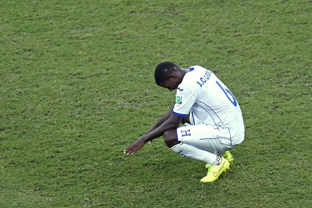 Honduras' Juan Carlos Garcia reacts after being defeated by Switzerland, 3-0, during the group E World Cup soccer match between Honduras and Switzerland at the Arena da Amazonia in Manaus, Brazil, Wednesday, June 25, 2014. (AP Photo/Frank Augstein) Honduras' Juan Carlos Garcia reacts after being defeated by Switzerland, 3-0, during the group E World Cup soccer match between Honduras and Switzerland at the Arena da Amazonia in Manaus, Brazil, Wednesday, June 25, 2014. (AP Photo/Frank Augstein)