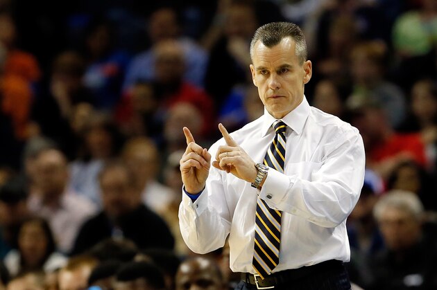 MEMPHIS, TN - MARCH 29:  Head coach Billy Donovan of the Florida Gators motions to his players during the south regional final of the 2014 NCAA Men's Basketball Tournament against the Dayton Flyers at the FedExForum on March 29, 2014 in Memphis, Tennessee.  (Photo by Kevin C. Cox/Getty Images)