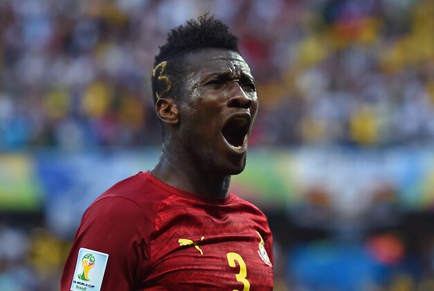 FORTALEZA, BRAZIL - JUNE 21:  Asamoah Gyan of Ghana celebrates scoring his team's second goal during the 2014 FIFA World Cup Brazil Group G match between Germany and Ghana at Castelao on June 21, 2014 in Fortaleza, Brazil.  (Photo by Laurence Griffiths/Getty Images)